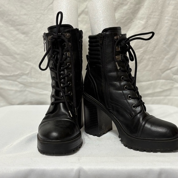 Shoes - Heeled lug sole hiker booties. Size 9
